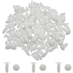 White plastic clips on a white background