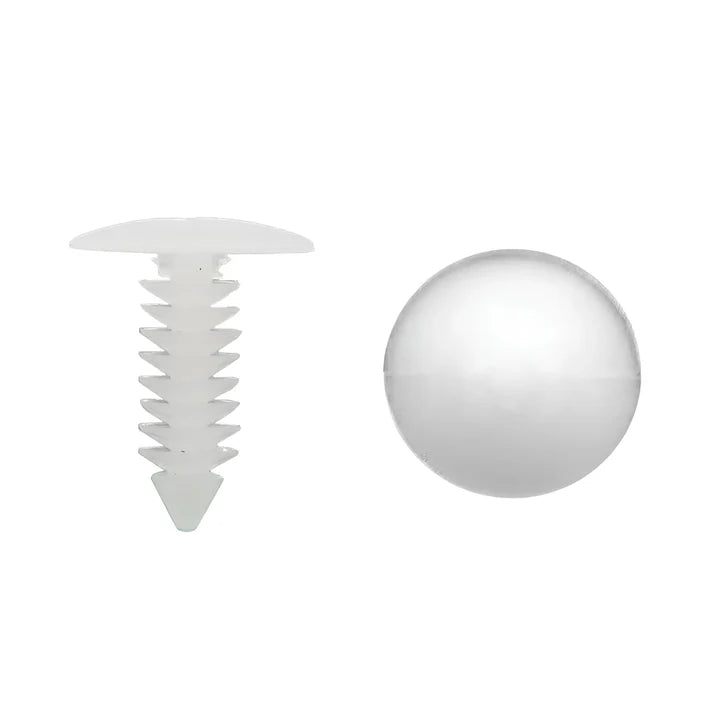 White plastic clip and sphere on a white background