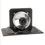 Black exhaust fan with white blades on a white background