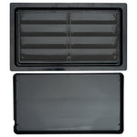 Metal grating in black plastic frame and interior of cover lid