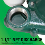 Close-up of a green valve with NPT discharge specification on a green background